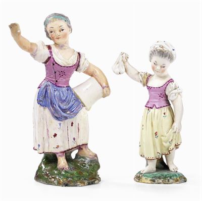 Due Statuette in Maiolica Policroma