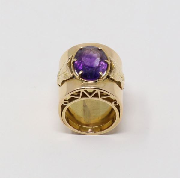 Anello in oro giallo a fascia con ametista centrale