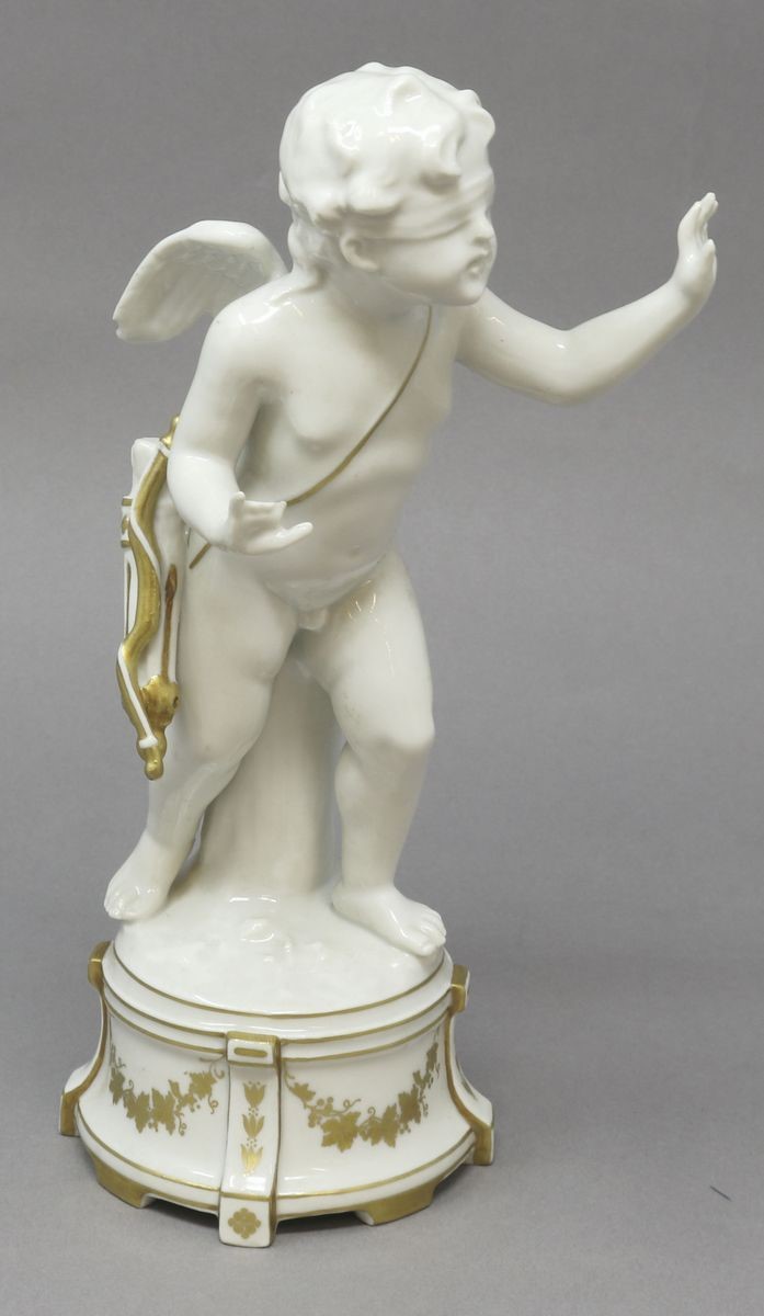 Sette Amorini in Porcellana Bianca e Oro