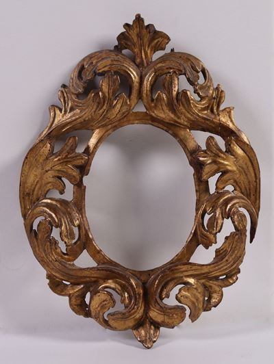 Cornice Ovale in Legno Intagliato e Dorato a Foglia a Cartoccio