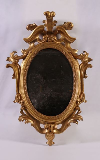 Specchiera Ovata in Legno Intagliato e Dorato