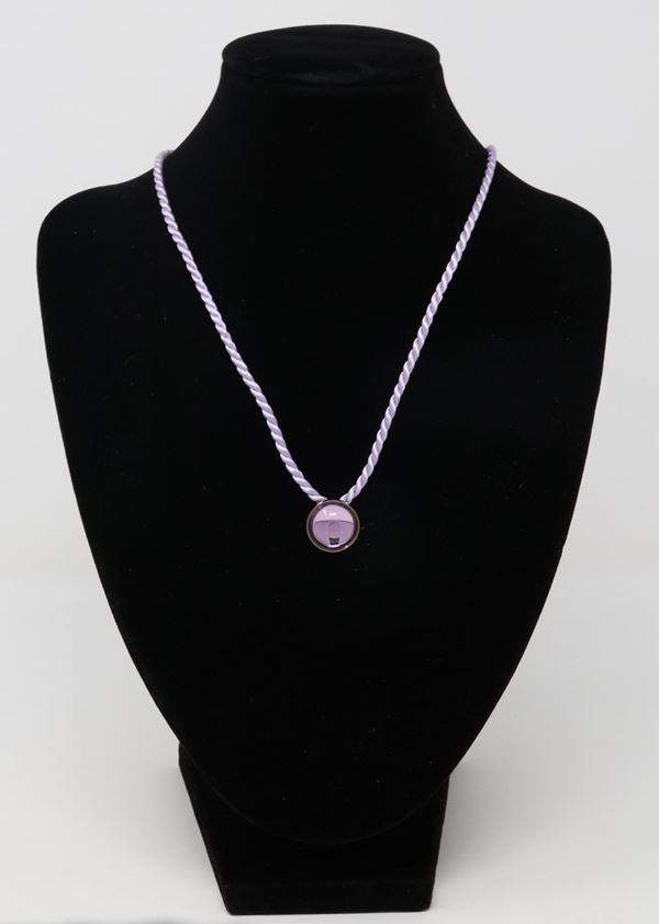 Pendente di Lalique in metallo dorato e cristallo rosa cabochon