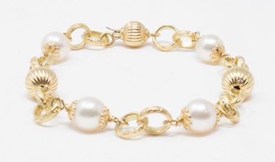 Bracciale in Oro Giallo a Maglia Morbida con Sfere in Oro e Perle
