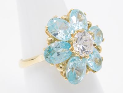 Anello in Oro Giallo a Fiore con Brillante e Acquemarine