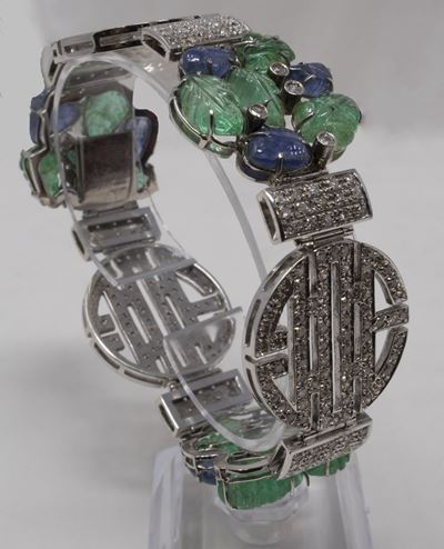 Bracciale in Oro Bianco con Pavé di Brillanti e Foglie di Smeraldo e Zaffiro