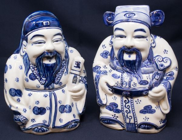 Coppia di sculture in porcellana bianco blu