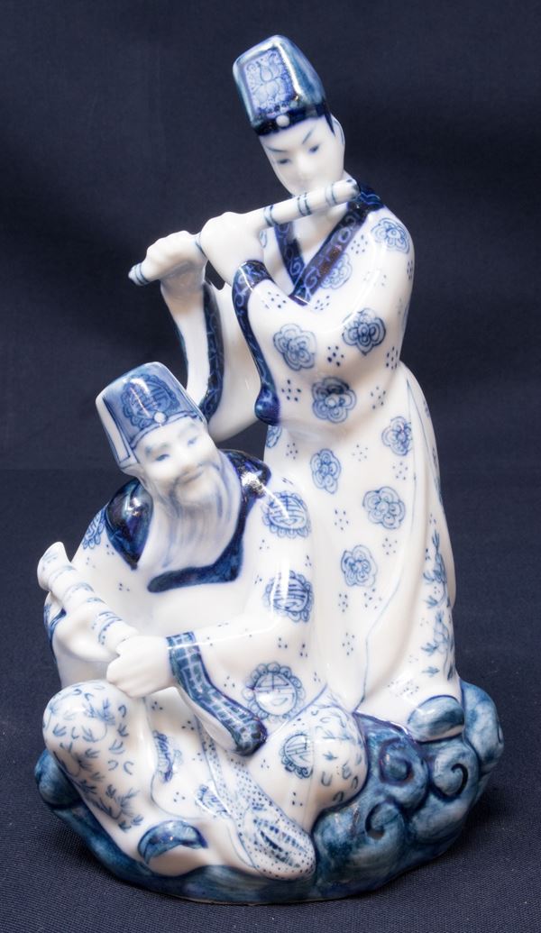 Scultura in porcellana bianco blu