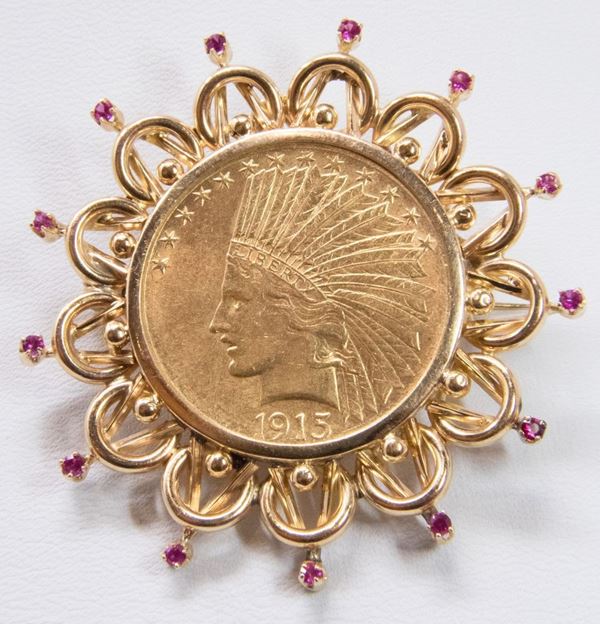Pendente circolare con spilla in oro giallo